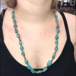 Turquoise necklace with sterling silver latch.